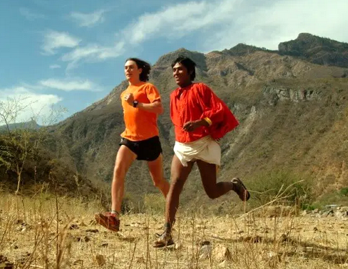 Born to Run: Scott JureK running with Arnulfo Quimarae